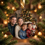 Personalized photo acrylic ornament with a family photo and three lines of text, hanging on a Christmas tree